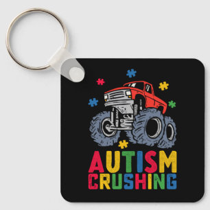 Medvetenhet om monstertruck för autism krossar poj nyckelring