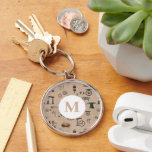 Mekaniskt vetenskapligt monogram för antikoteknik rund silverfärgad nyckelring<br><div class="desc">Ett unikt tema för antikverksteknik som omfattar verkstadstekniska skisser för teckning och vetenskapliga mekaniska skisser. En matematik och ingenjör-konst med antika riter. En underbar utformning för ingenjör,  verkstadsindustrin studenter,  vem som helst som har kärlek mekaniska skisser,  fysik,  matematik och tekniskt teckning.</div>