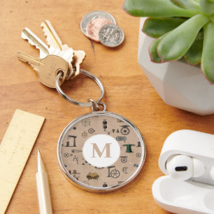 Mekaniskt vetenskapligt monogram för antikoteknik rund silverfärgad nyckelring
