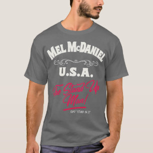 Mel McDaniel står på det TShirt T Shirt