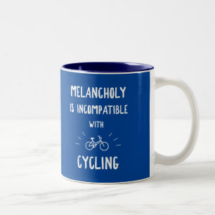 Melancholy är inkompatibel med cykling Två-Tonad mugg