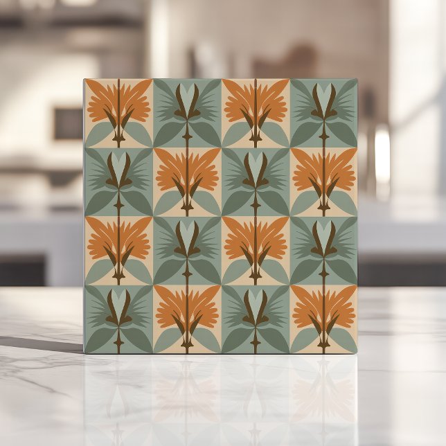 Mellandekorativ blomsterdesign i orange och blå kakelplatta (Skapare uppladdad)