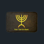 Menorah Flame Badrumsmatta<br><div class="desc">En brunfärgad och guld digital rendering av den judiska sjugrenade menorah (hebreiska: מְ נ וֹ רָ ה ‎). Lägg till din egen text. Den sjukanta menorah som används i den portabla fristad som Moses upprättade i vildmarken och senare i Temple i Jerusalem har varit en symbol för judendomen sedan urminnes...</div>