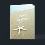 Merry Coastal Beach jul Starfish Card Helgkort<br><div class="desc">Ett strandfoto med vit finger-stjärnfisk.</div>