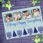 Merry Navy Intertron Menorah Träd Cute 4 Photo Julkort<br><div class="desc">Anpassa dessa fyra helgdagskort för fotokollage i en enkel marin blå och pastellblå Merry Lycklig All interreligiös design. Ett elegant stiliserat skript i blått med en liten skugga i vitt ökar intresset, och raden med fem marinblå Menorahs och fyra matchande Julgranar gör dessa platta helgdagskort till ett val av snyggt...</div>