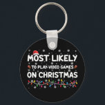 Mest troligt att spela videospel i julspel nyckelring<br><div class="desc">Mest troligt att spela videospel i julspel</div>