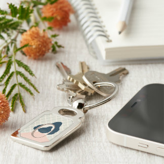 metafor_15_a-flicka i spegel metall rektangulärt silverfärgad nyckelring