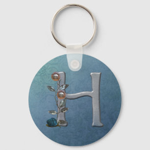 Metall blommar MonogramH Nyckelring