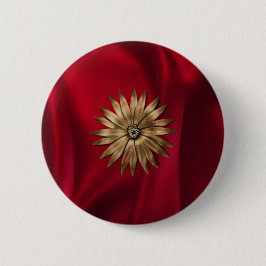 Metallisk blomma på siden.jpg knapp