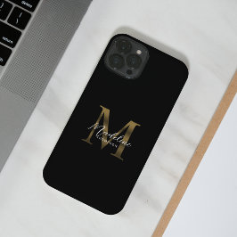 Metallisk svart Guld-monogram med stilskript