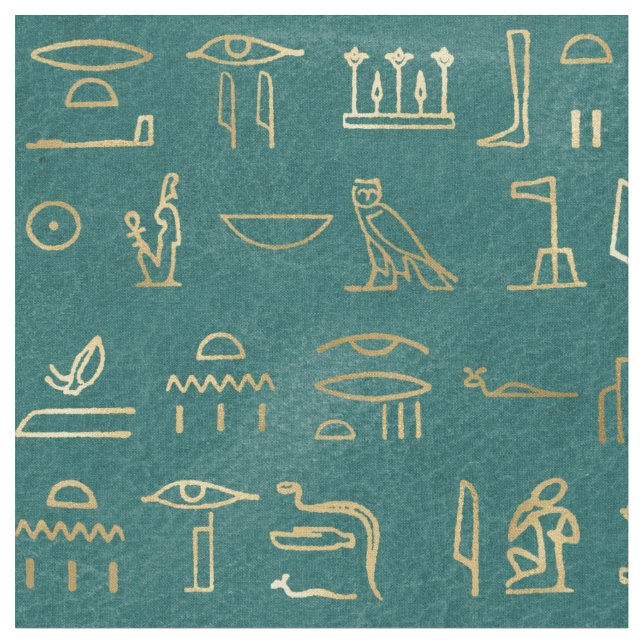 Metalliska Guld-egyptiska Hieroglyfer på Grönt Tyg (Närbild)
