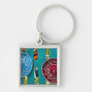 Mexiko, Cozumel. Souvenirer i Isla de Cozumel Fyrkantig Silverfärgad Nyckelring