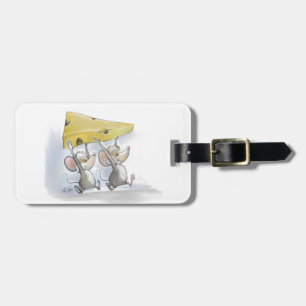 Mic & Mac-brickor i ostens bagagetapp Bagagebricka