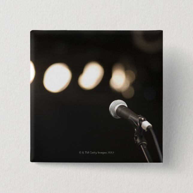 Mikrofon och strålkastarear knapp (Framsida)