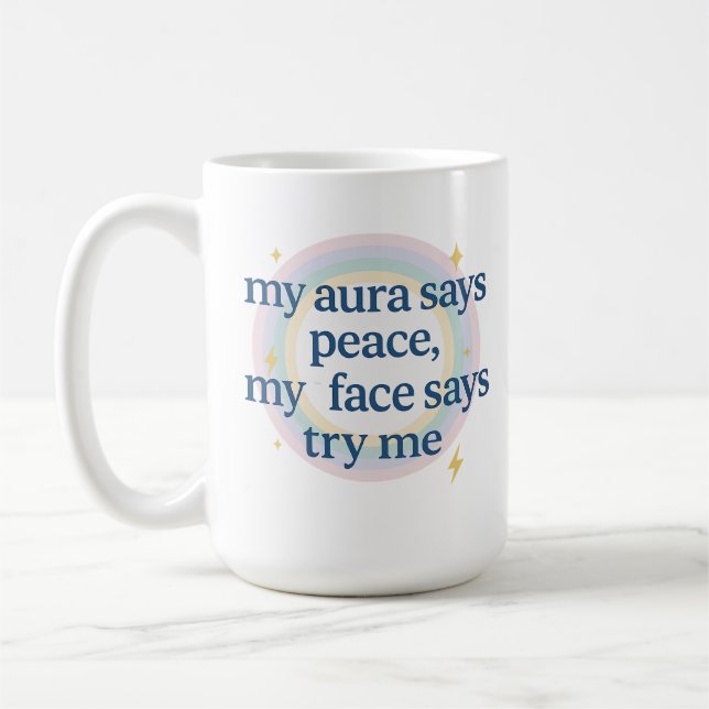Min aura säger fred, mitt ansikte säger testa mig kaffemugg (Vänster)
