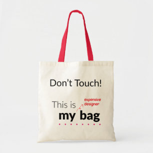 Min dyra formgivare hänger lös tygkasse