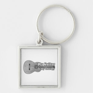 Min gitarr är min terapi. fyrkantig silverfärgad nyckelring