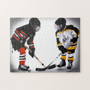 minderårighockeyspelare på faceoffpussel pussel