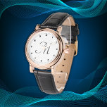 Minimal enkel inledande monogramtal svart | armbandsur<br><div class="desc">Upplev elegans vid rätt tidpunkt med den här fantastiska klockan som har ett klassiskt ro guld fodral parsat med ett vintage-inspirerat svart band. Den förfinade utformningen omfattar en sofistikerad svart rang med minimalistiska siffror och ett känsligt inledande monogram, som skapar en chic kontrast mot de varma guld-tonerna i ro. Den...</div>