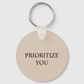 Minimal Prioritera Du Citat Beige Nyckelring