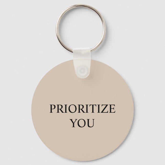 Minimal Prioritera Du Citat Beige Nyckelring (Framsida)
