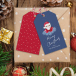 Minimal Santa Cute Poinsettia Blue God jul Presentetikett<br><div class="desc">Denna minimala märkre för "God jul"-helgdag har en hand plockade-vismisk tomte och blek blå poinsettias på en traditionell mörk blått bakgrund som tillför en liten aning nostalgiskt stollig. Originalkonst av Malissa Melrose.</div>