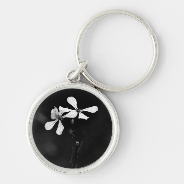 minimal svart och vit blom- rund silverfärgad nyckelring (Framsidan)