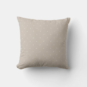 Minimala vita prickar på sval beige gråbeige kudde