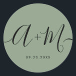 Minimalist Monogram Script Custom green Wedding Runt Klistermärke<br><div class="desc">Elevate your wedding details with the Minimalist Monogram Script Custom Wedding Date green Sticker. This elegant and personalized sticker adds a touch of sophistication to your wedding stationery, allowing you to showcase your monogram and wedding date in a simple yet impactful way. The sticker features a minimalist script design that...</div>