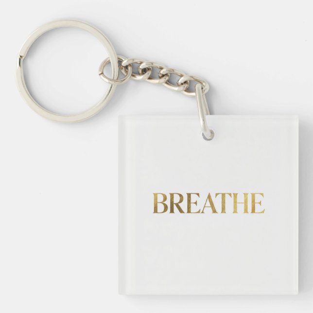 Minimalist typography with gold word breathe (Framsidan)