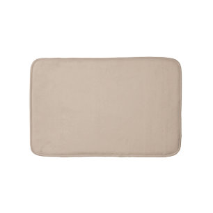 Minimalistisk beige än neutralt fast elegant badrumsmatta