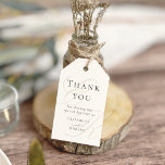 Minimalistisk Beige Monogram Bröllop Tack Presentetikett<br><div class="desc">Lägg till en personlig och elegant till dina bröllopsfavörer med dessa minimalistiska tack som du ger märkre. Dessa märkre har en subtil beige monogram och ren, modern typografi. De är perfekter för att binda sig vid presentsäckar, favoritboxar eller små keepsakes. De är designade för att komplettera insamlingen i fullt Beige...</div>