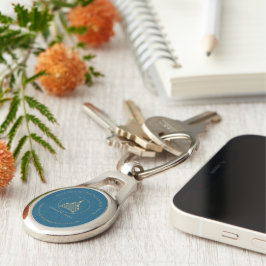 Minimalistisk chic Blue, Brown Real Gods Agent Ovalt Silverfärgad Nyckelring