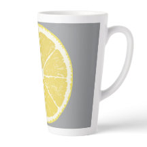 Minimalistisk citronskiva på grå latte-mugg