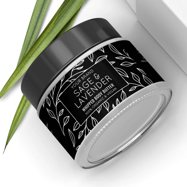Minimalistisk etikett för svart Blommigt, kosmetis (Minimalist floral skincare jar wrapper label template in black and white with)