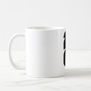 Minimalistisk fotbollstrofe siluett vit på svart kaffemugg