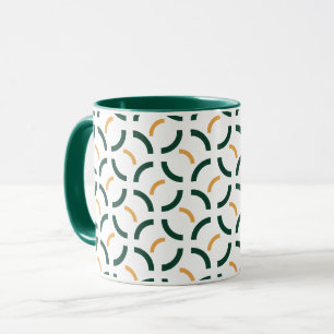 Minimalistisk geometrisk skoggrön och senapsgul bå mugg
