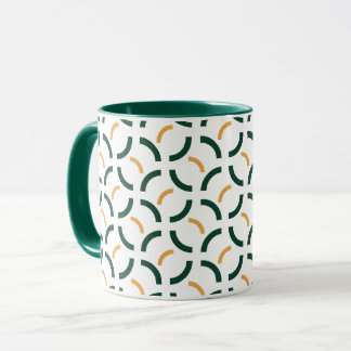 Minimalistisk geometrisk skoggrön och senapsgul bå mugg