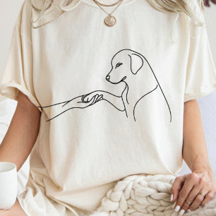 Minimalistisk linjeillustration av hundfötter och  t shirt
