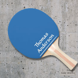 Minimalistisk modern vit på blå pingisracket