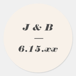 Minimalistisk monogram svart och elfenbensvit vigs runt klistermärke