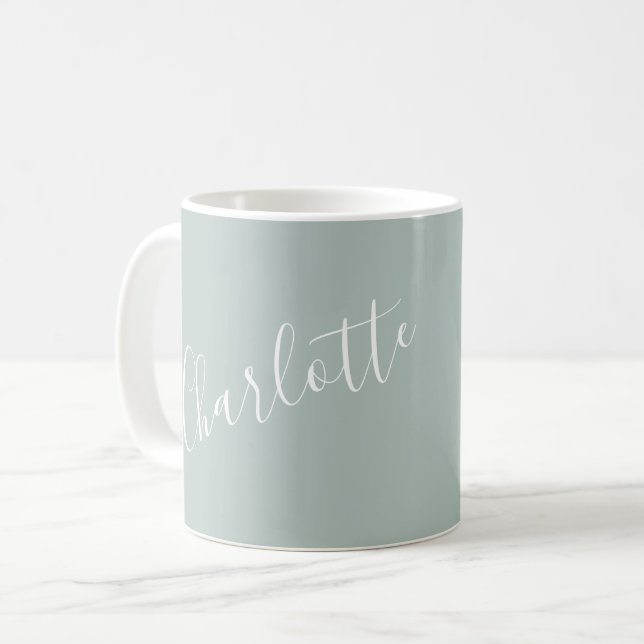 Minimalistisk namnskrift i dammig blå kaffemugg (Framsida vänster)