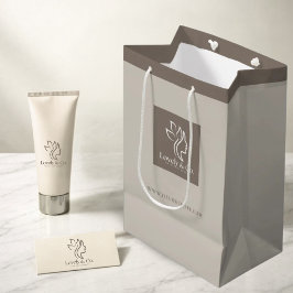 Minimalistisk neutral beige presentpåse för skönhe