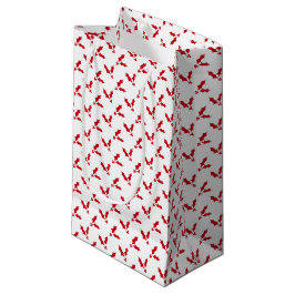 Minimalistisk röd julbär på vit jul