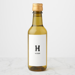 MINIMALISTISK SVART EN BOKSTAV MONOGRAM NAMN VIT VINETIKETT