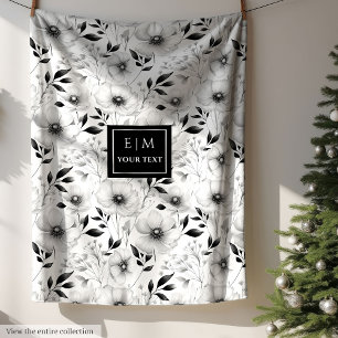 Minimalistisk svartvit filt med blommor