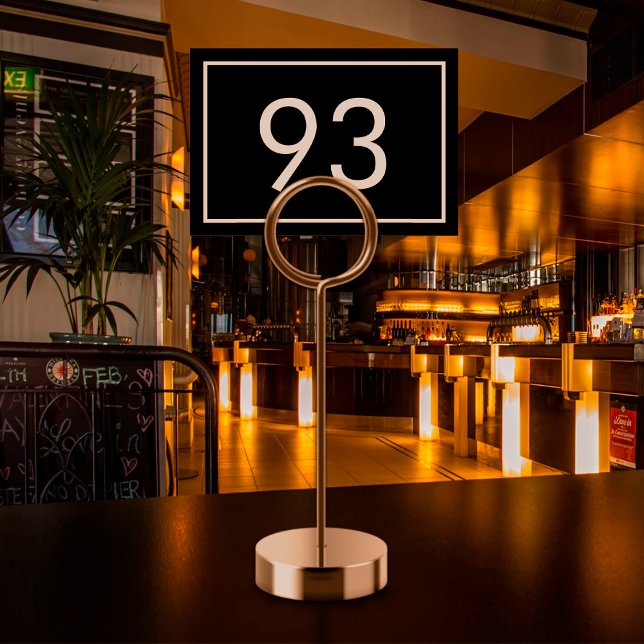 Minimalistisk svartvit textredigerare bordsnummer (Black restaurant table number with white text)