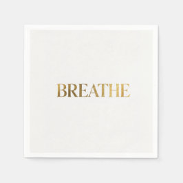 Minimalistisk typografi med guldbokstav andas pappersservett