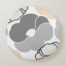 Minimalistiska botaniska motiv, neutral beige och rund kudde