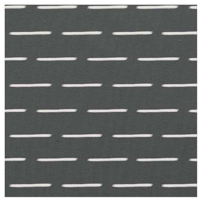 Minimalistiska elfenbenslinjer på svart tyg (Närbild)
